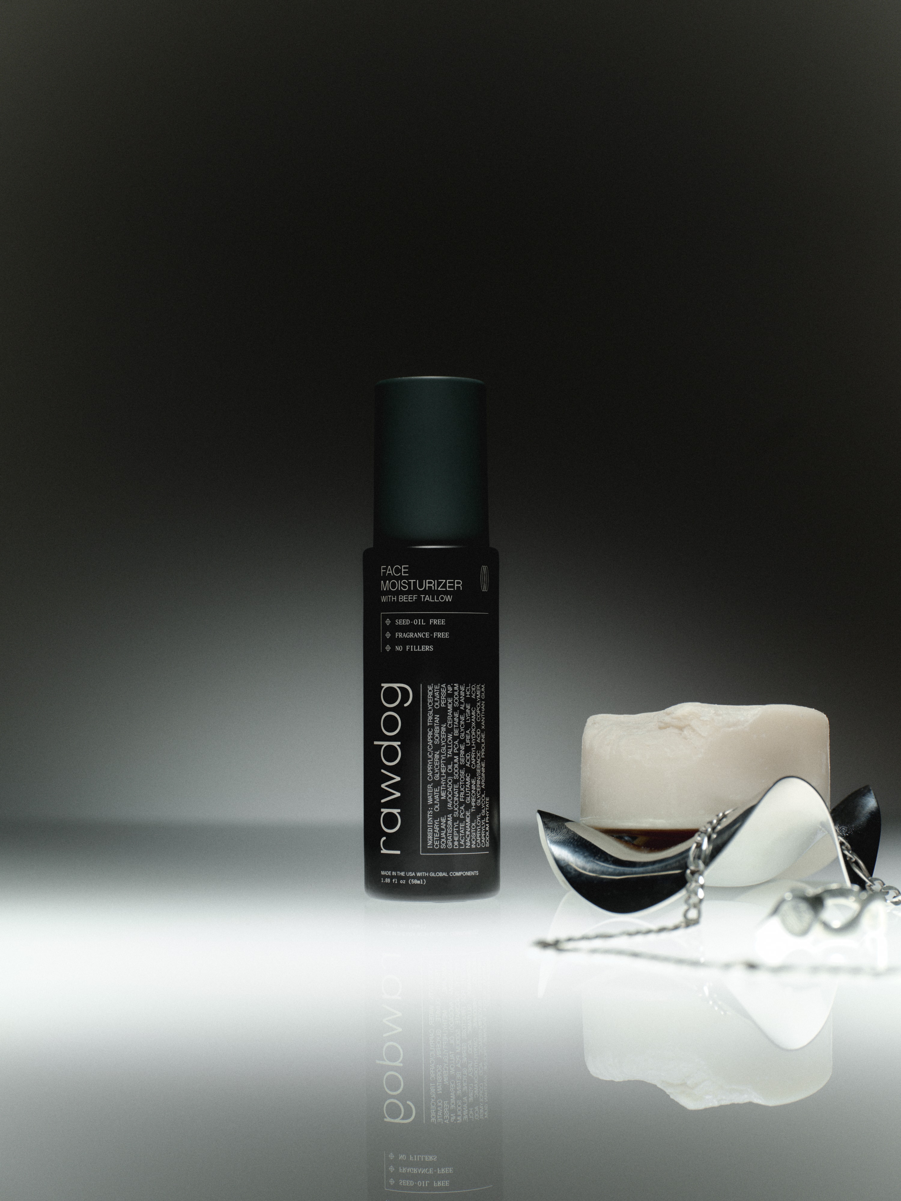 RAWDOG Face Moisturizer beside a block of beef tallow