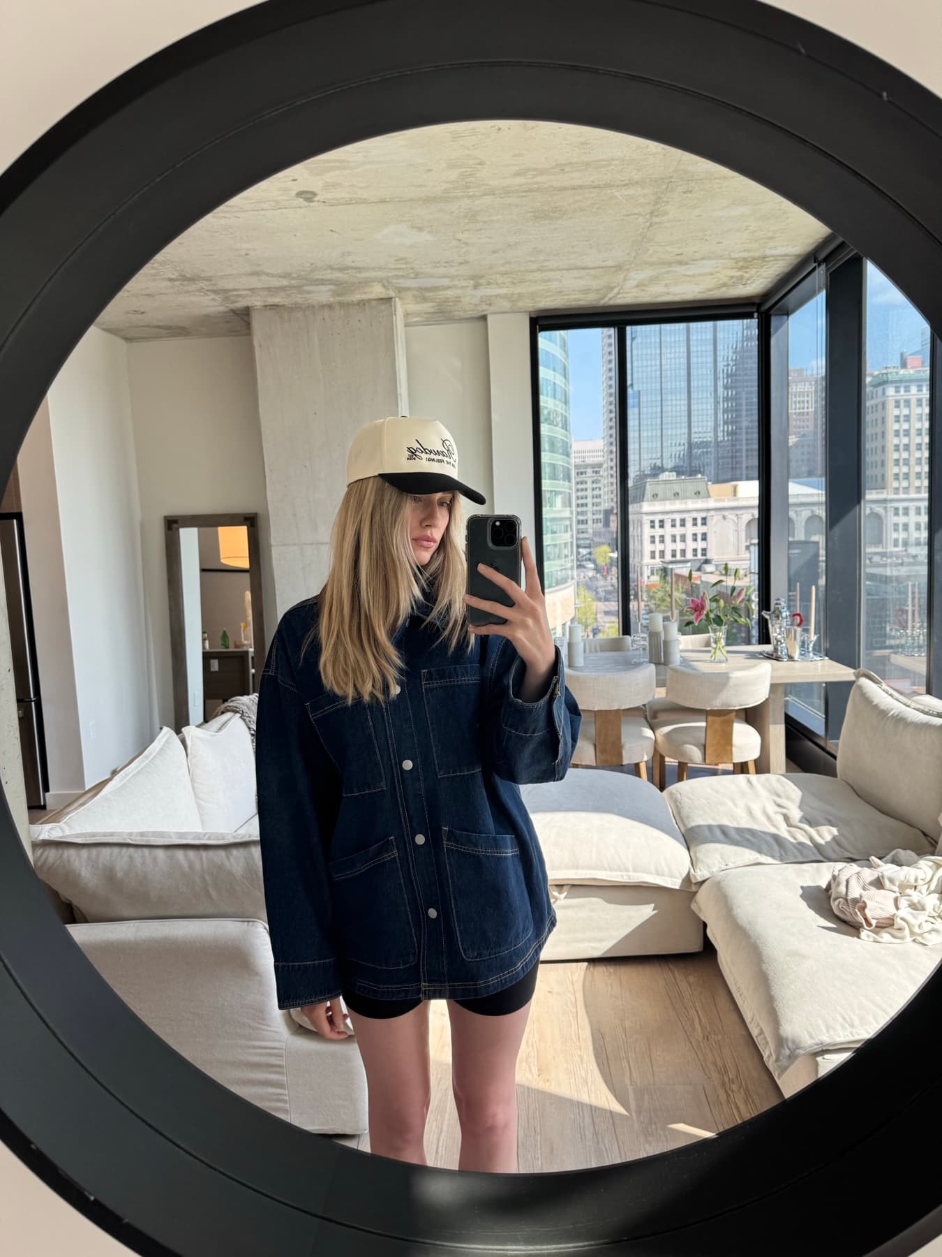 RAWDOG community member wearing the trucker hat in a mirror selfie