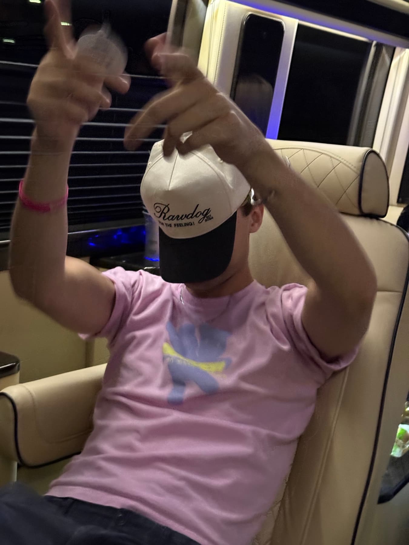 RAWDOG community member wearing the trucker hat while traveling