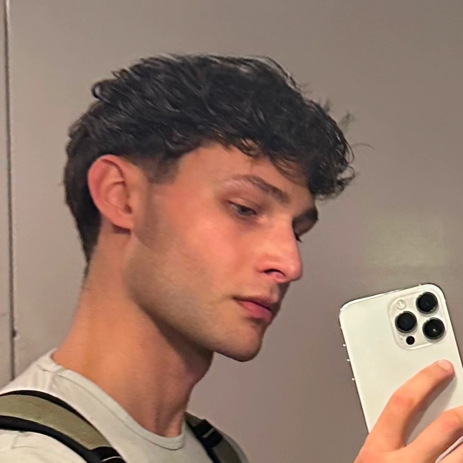 Customer mirror selfie showing rested-looking under-eyes